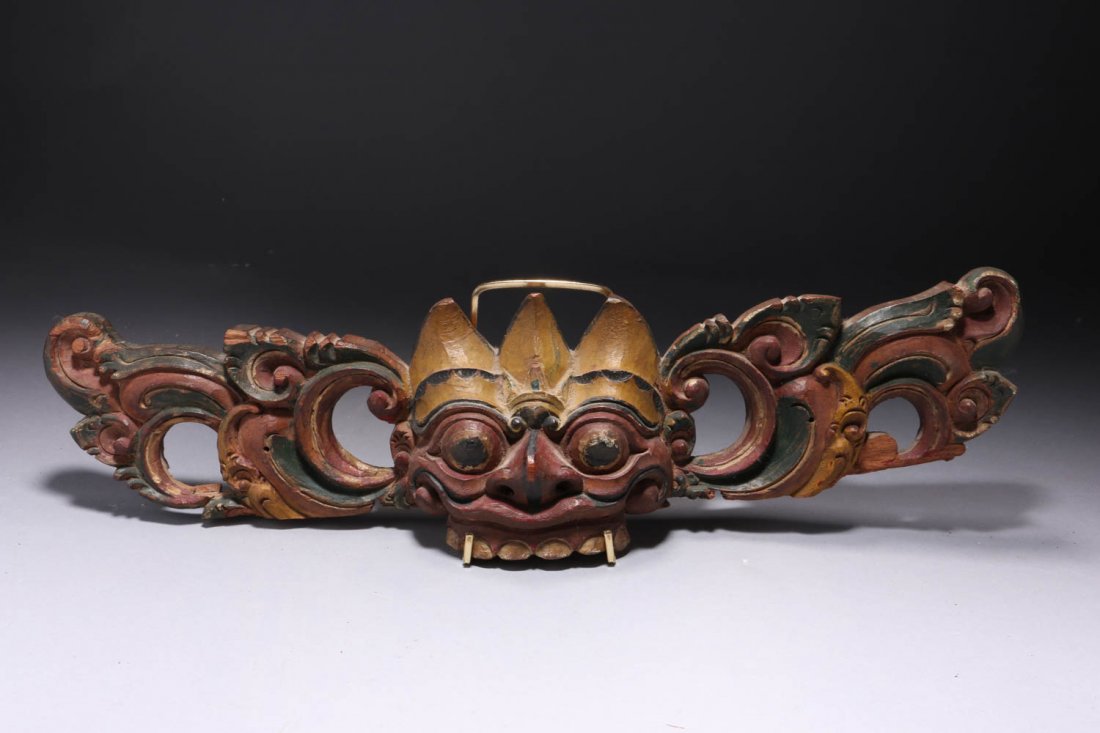 Indonesian Panel: An architectural panel of face with bulging eyes. 17" L x 5"