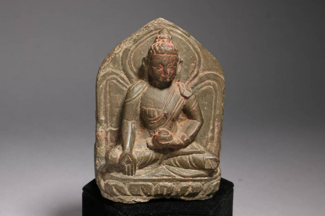 Nepal Stone Buddha: A carved stone Buddha with pigmentation remains. 4-1/4 x 3 " Provenance: Ex, private collection, Mass.