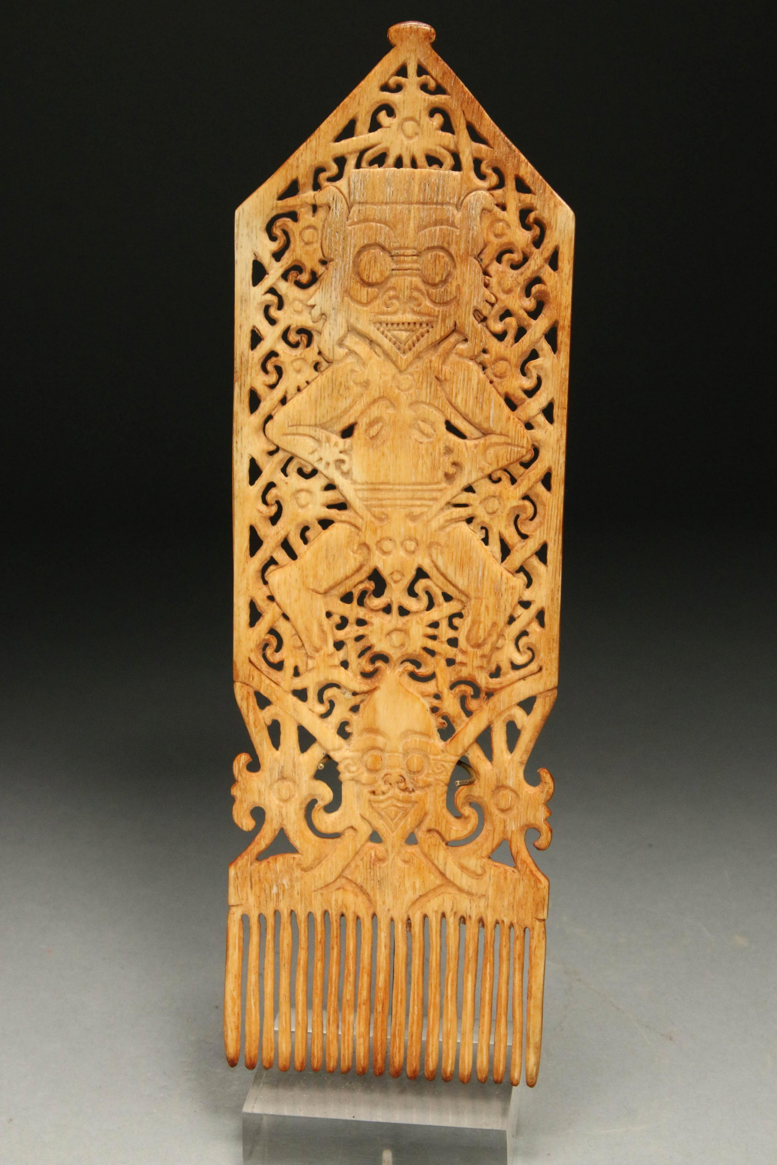 Indonesian Bone Comb - Antique: A intricately carved bone comb. 8-1/2"H