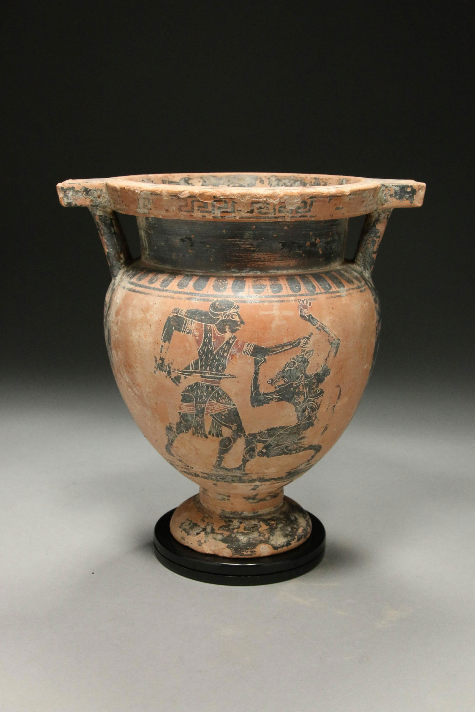 Greek Krater Vase: A Greek column krater vase, age unknown. 8-1/2" H ; 2 lbs.