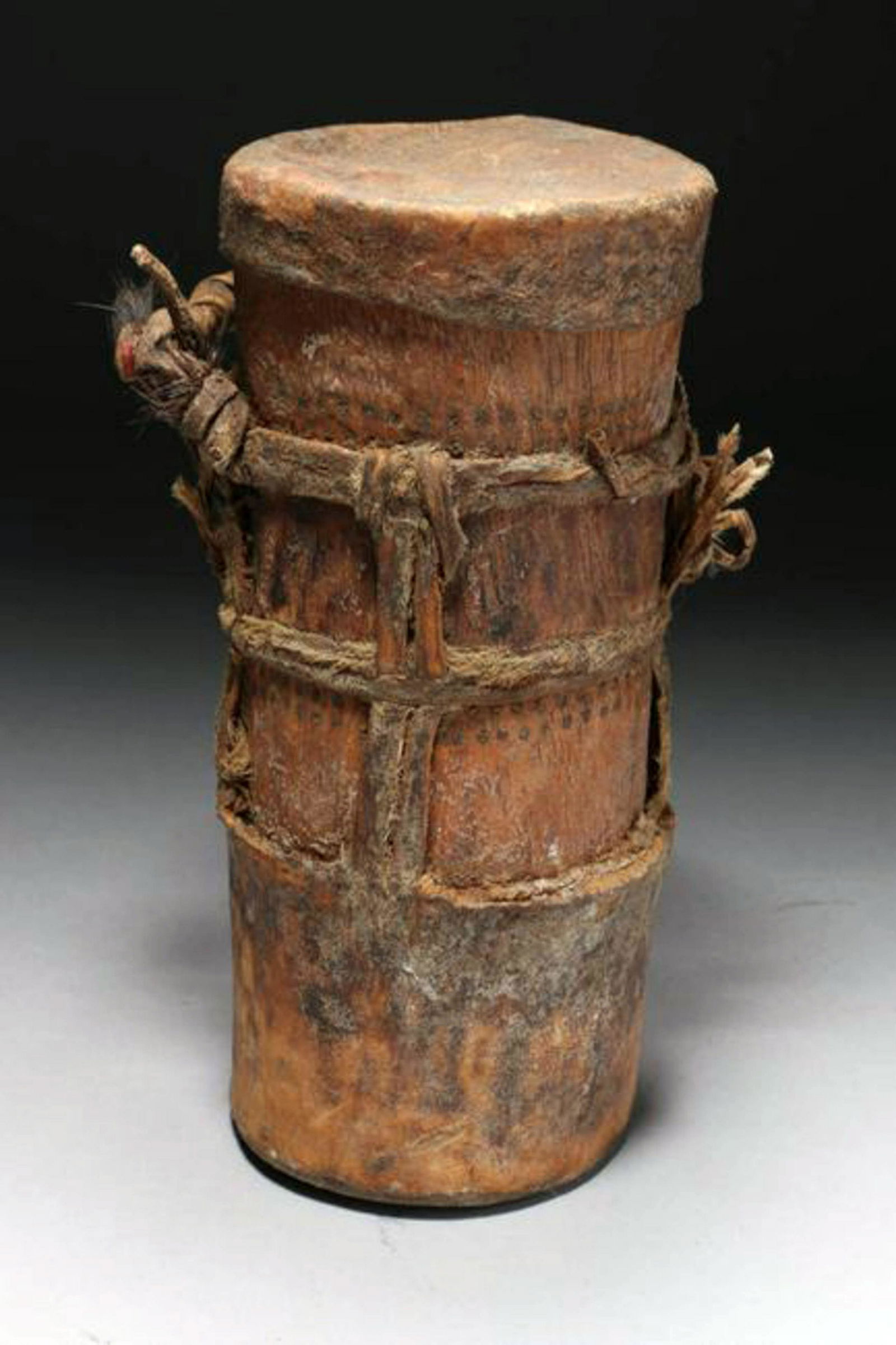 Native America Wood Drum: A small wood drum, skin, twine. 7-1/4" H