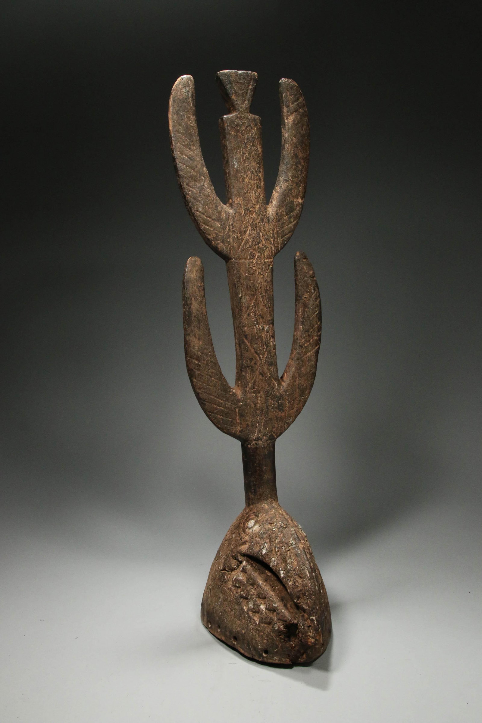 African Art Burkina Faso Helmet Mask: A wood chicken helmet mask, great patina. 28" H. Provenance: Ex collection, Herbert Pardes, Dean of Columbia University School of Medicine