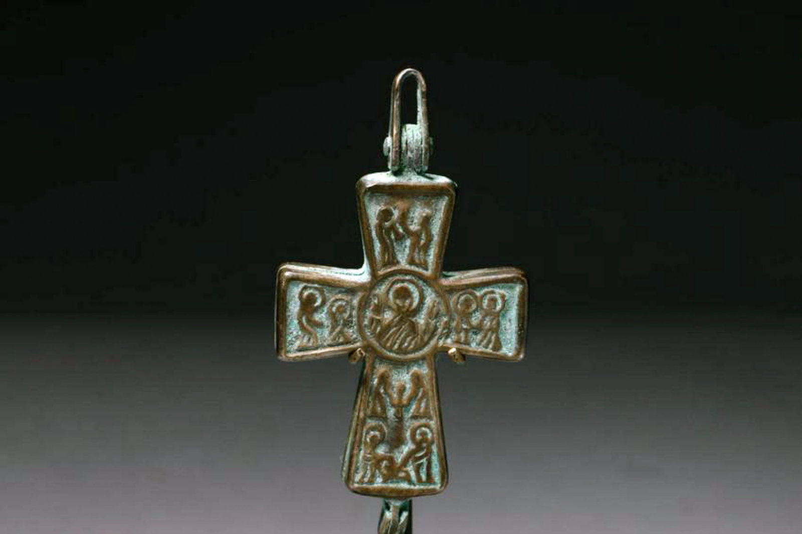 Byzantine Bronze Cross: Byzantine bronze cross , 9th century AD, with sainted figures both sides, hinged, suspension loop. Unopened. 3" L Provenance: Ex private collection, NY State