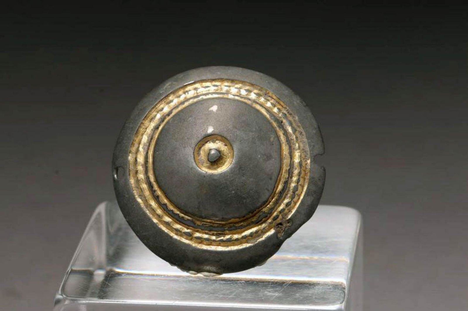 Roman Gold and Lead Phalera: A lead phalera with gold highlights. 1-3/8" dia. Provenance: Ex. Private collection,NYS