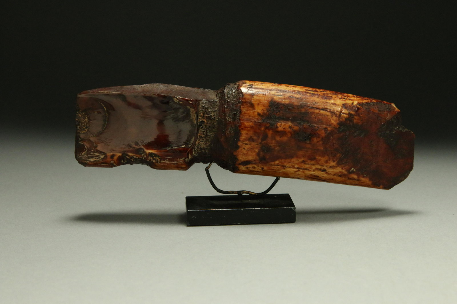 Inuit Adze: A petrified walrus bone adze with usage wear, great patina. 6" L Provenance: Ex collection Mass. Acquired from