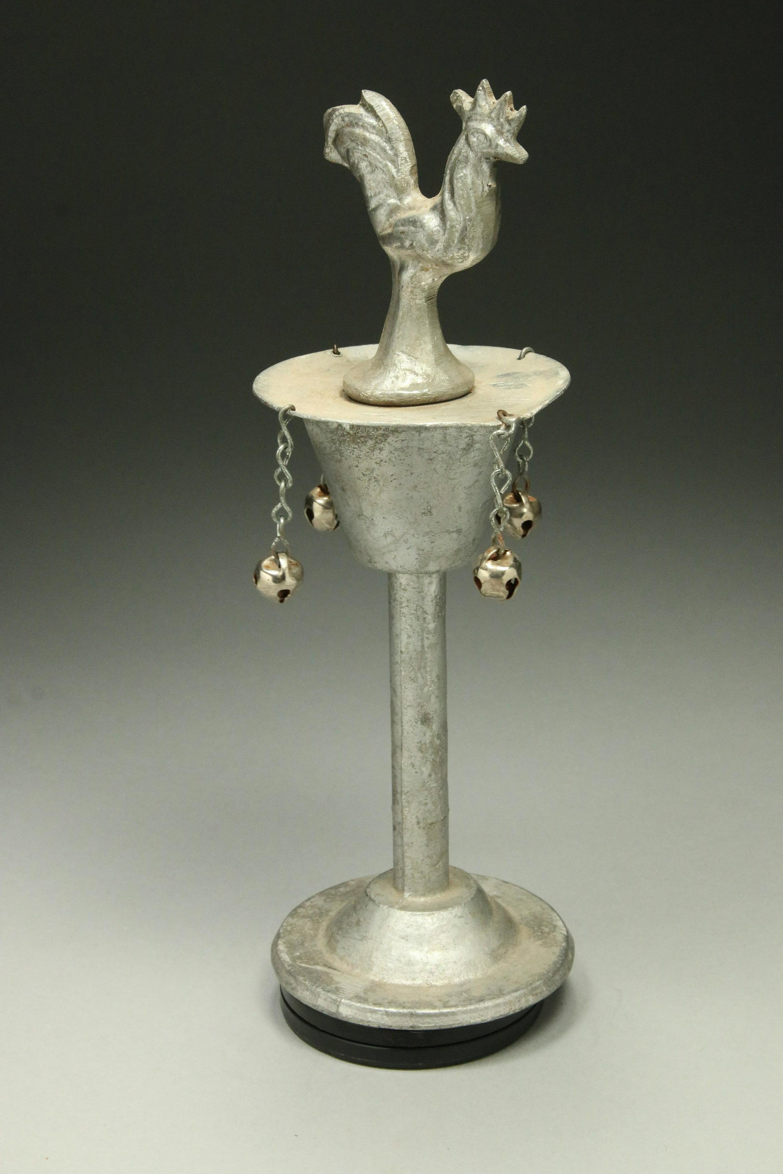 Santeria Chalice of Osun: A metal chalice with rooster on top, metal bells at side. A deity of protection and warning. 10" H