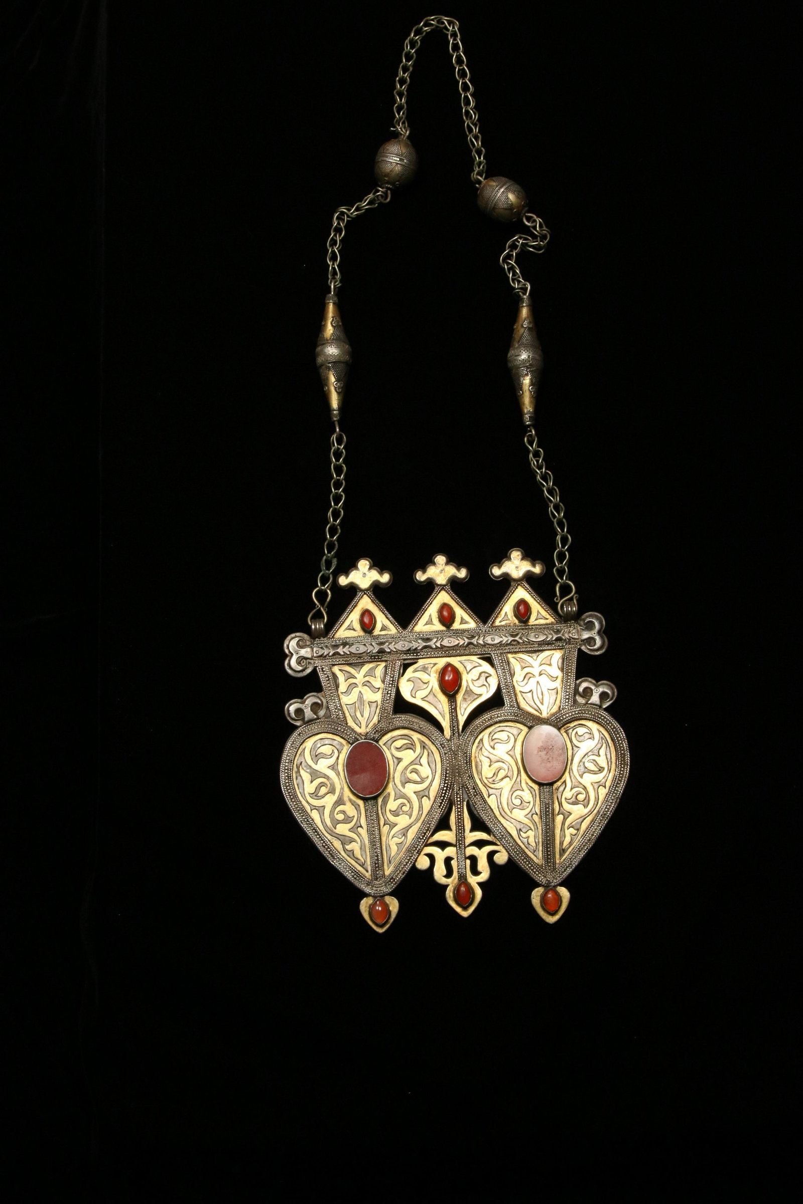Turkmen Pendant Necklace: An old Tekke people necklace, with metal bead, metal work and inlaid carnelian. Massive pendant