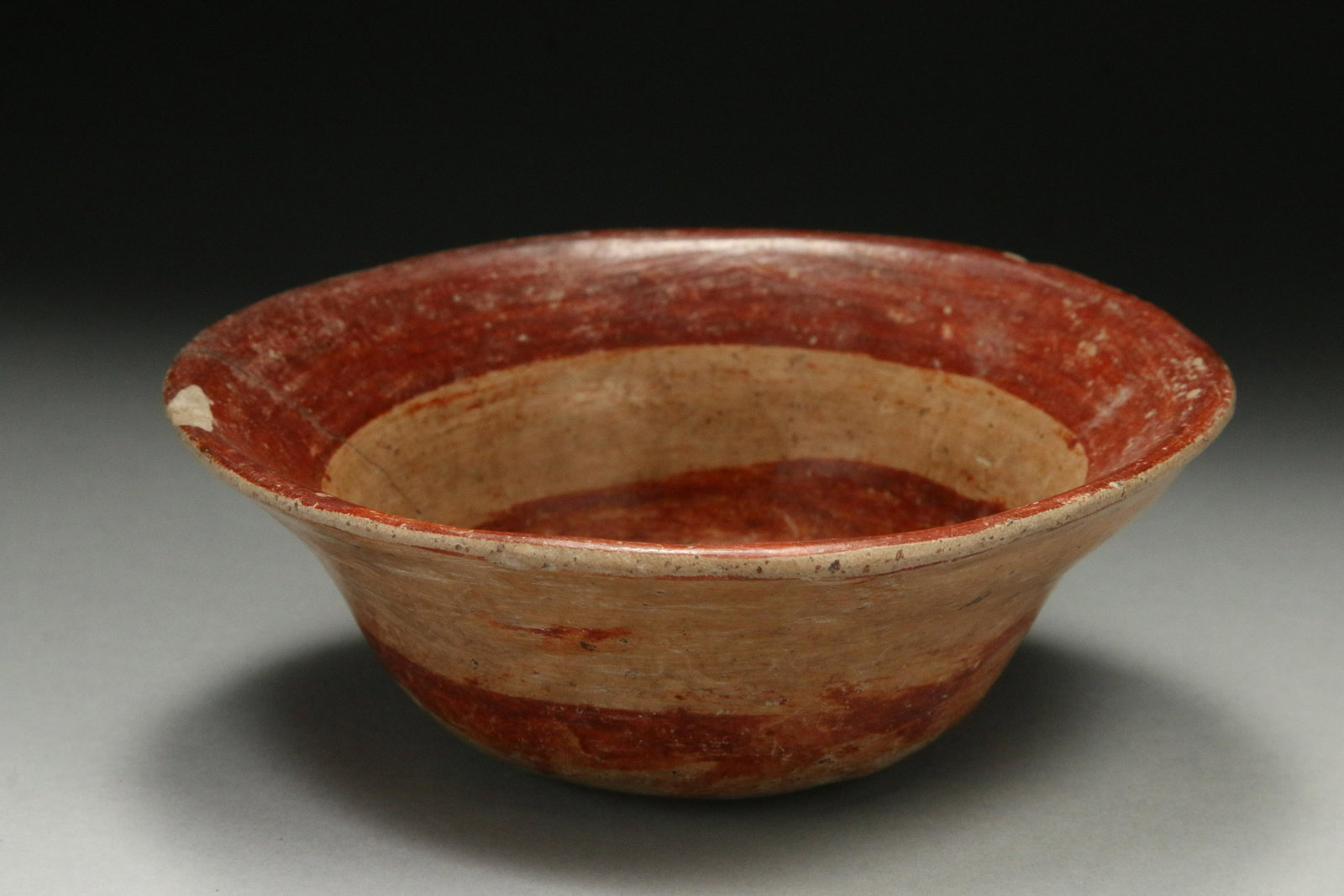Pre-Columbian Bowl: A small ceramic bowl with interior grating surface. 2-1/4" H x 5-1/2" W
