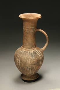 Ancient Ceramic Jug Greek: A Late Bronze age, Cyprus - Greek ceramic jug with handle, long neck, flared mouth with lip, linear design on body and neck. 11" H; 1 lb. 4 oz. Provenance: Ex collection, New England