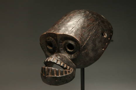 African Art - Monkey Mask: A powerful carving of a monkey head mask. Dogon, 14" L Provenance: Ex Thomas McNemar collection