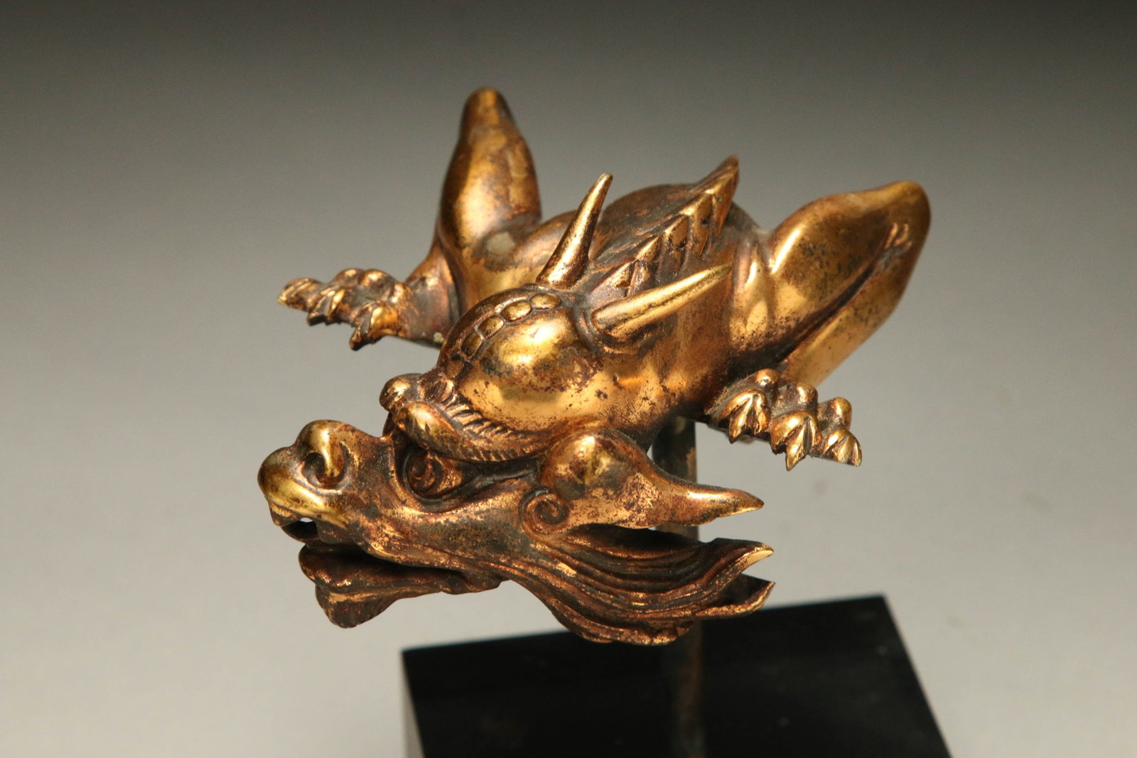 Chinese Bronze Dragon: A bronze gilded dragon in flight. 4" L, 1 lb. 7 oz. Display stand is included.