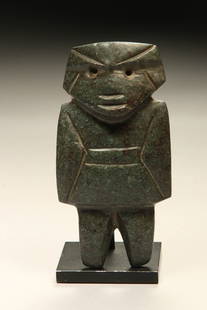 Pre-Columbian Mezcala Figure: A green stone Mezcala figure with string cut design. 4-1/2" H Provenance: Ex.