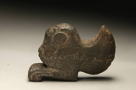 Pre-Columbian Axe Pendant: A stone axe pendant in the shape of an animal with large eyes. 3-1/2" L. Provenance: Ex collection, New York, NY