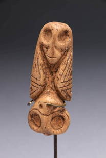 Pre-Columbian Taino Figure: A Taino small figure, two heads, calcified bone, 2-1/2" L Provenance: EX private collection, Bronx, NY