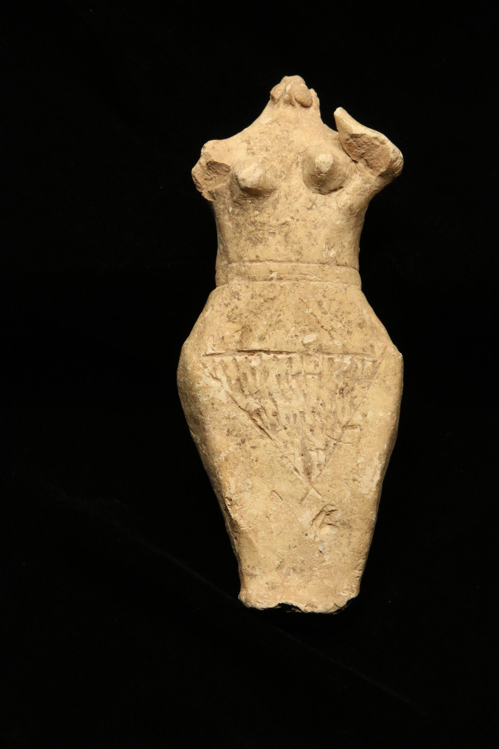 Ancient Clay Idol: A clay idol in the shape of a female, 5" H