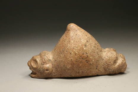 Pre-Columbian Taino Stone Zemi Trigonolith: A Taino stone trigonolith figure with Zemi face on both sides of the tall point. 9" L x 5" H x 3-1/2" W Provenance: Private Florida, USA collection, Ex collection Pierre Fayet,Paris France, acquired