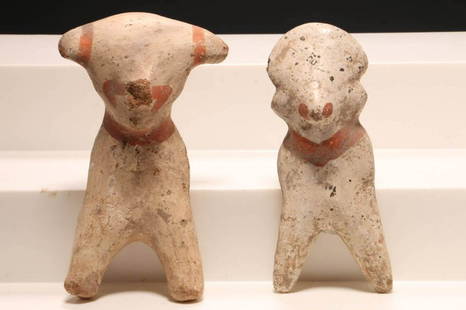 Pre-Columbian Figures - Lot of 2: Two terracotta statues, cream ground with light red highlights. 4" H and 3-7/8" H Provenance: Ex mass. Collection.