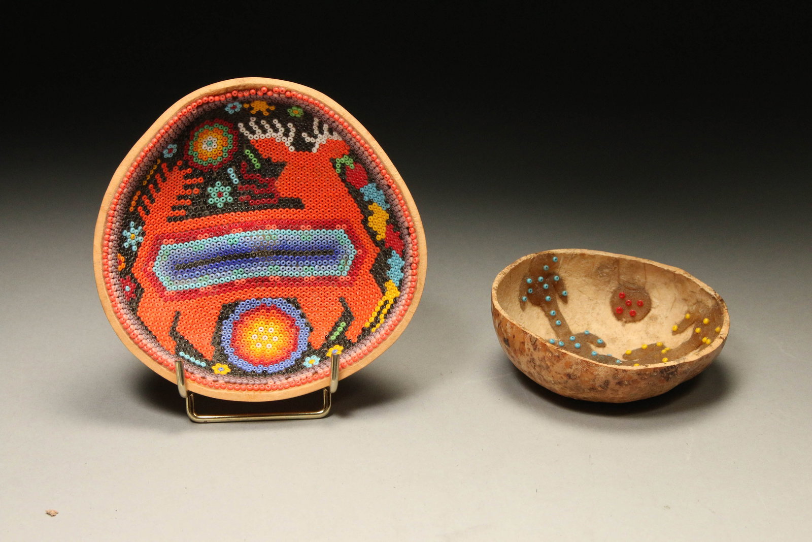 Old Huichol Beaded Bowls: Two small beaded bowls, one with a deer. Provenance Ex collection, S. Farr, Texas