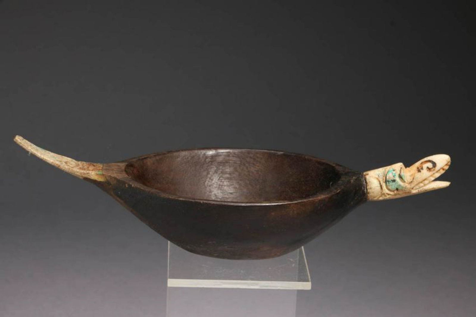 Inuit Bowl: An Inuit small bowl with walrus bone head and tail, 6-1/4 L "