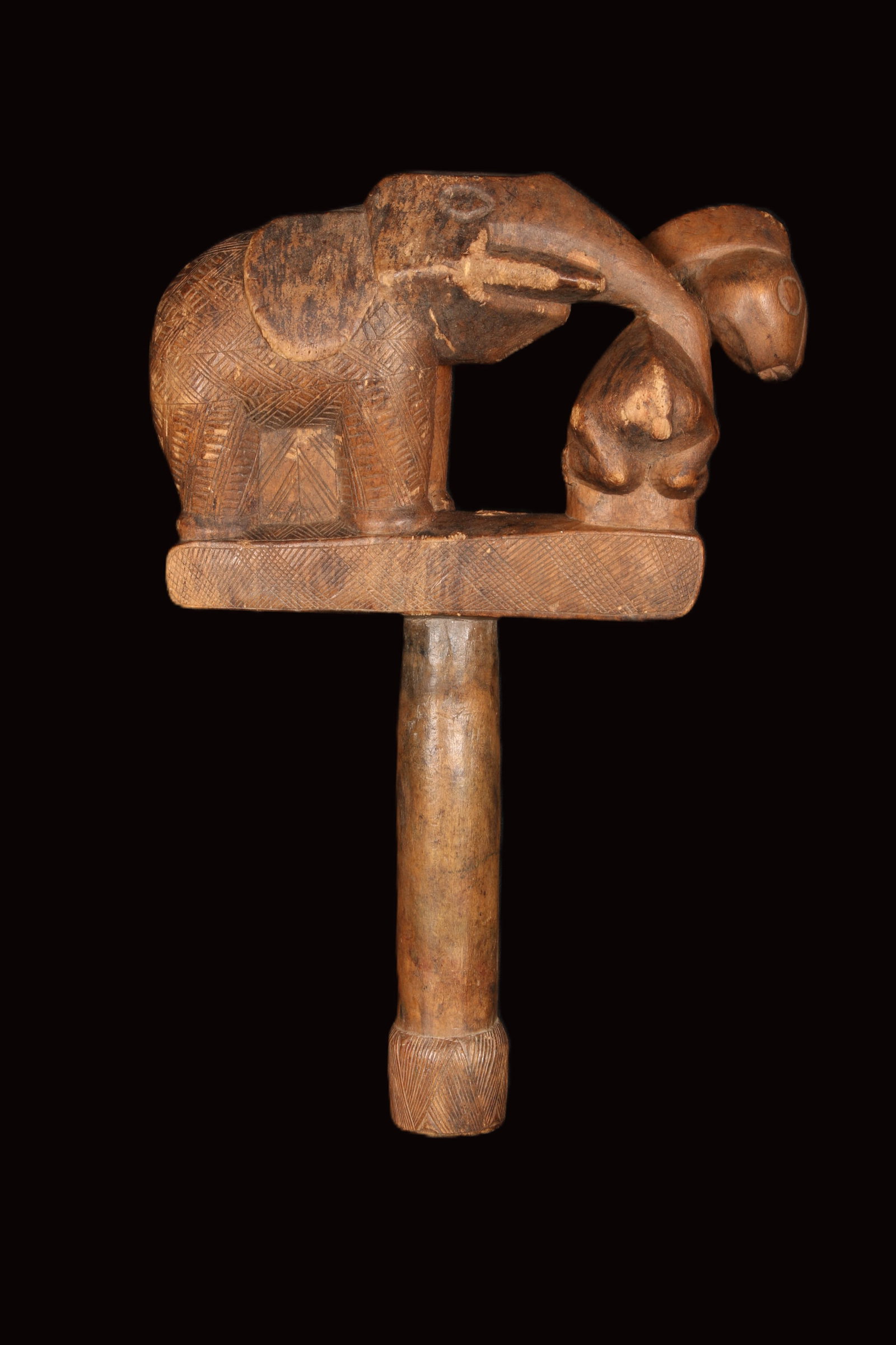 African Art Akan Staff Finial: A wood linguistic staff finial featuring an elephant and a long eared animal. Hole at bottom of staff for attachment. 12" H x 8" W