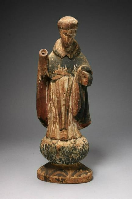 Spanish Colonial Wood Santos: A wood Santos, Philippines, robed, standing on a globe. 12" H