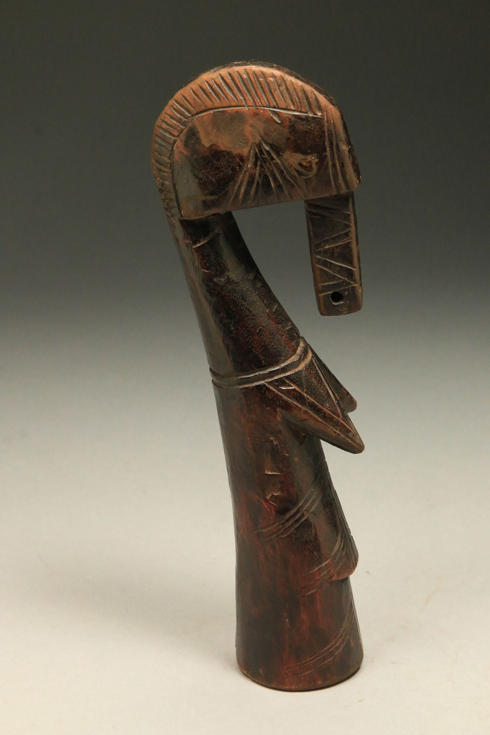 African Art - Mossi Doll - Burkina Faso: Traditional figure made from one piece of wood standing on a broader base. The biiga doll has signs of veneration rubbing at the top of the head which is consistent wit usage. Provenance: Ex. Collecti