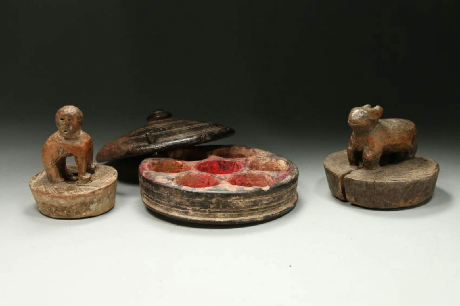 Southeast Asia Mixed Lot: A wood Indian Bindi box and two wood carved animal lids, Nepal
