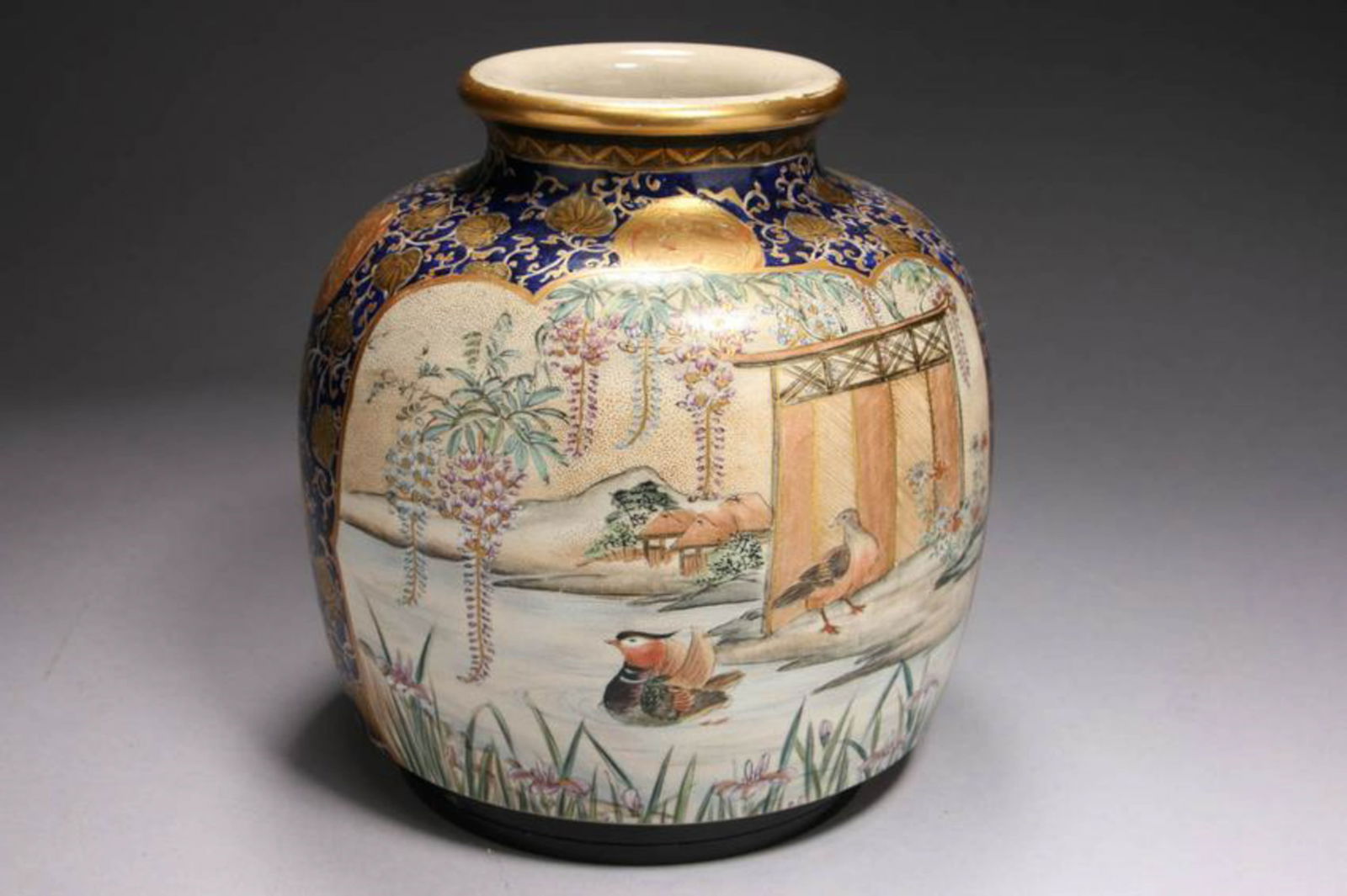 Japanese Satsuma: A Satsuma vase, with two registers of birds in country setting. Signed. 7-1/2 H x 7-3/4 W "; 3 l bs. 10 oz.