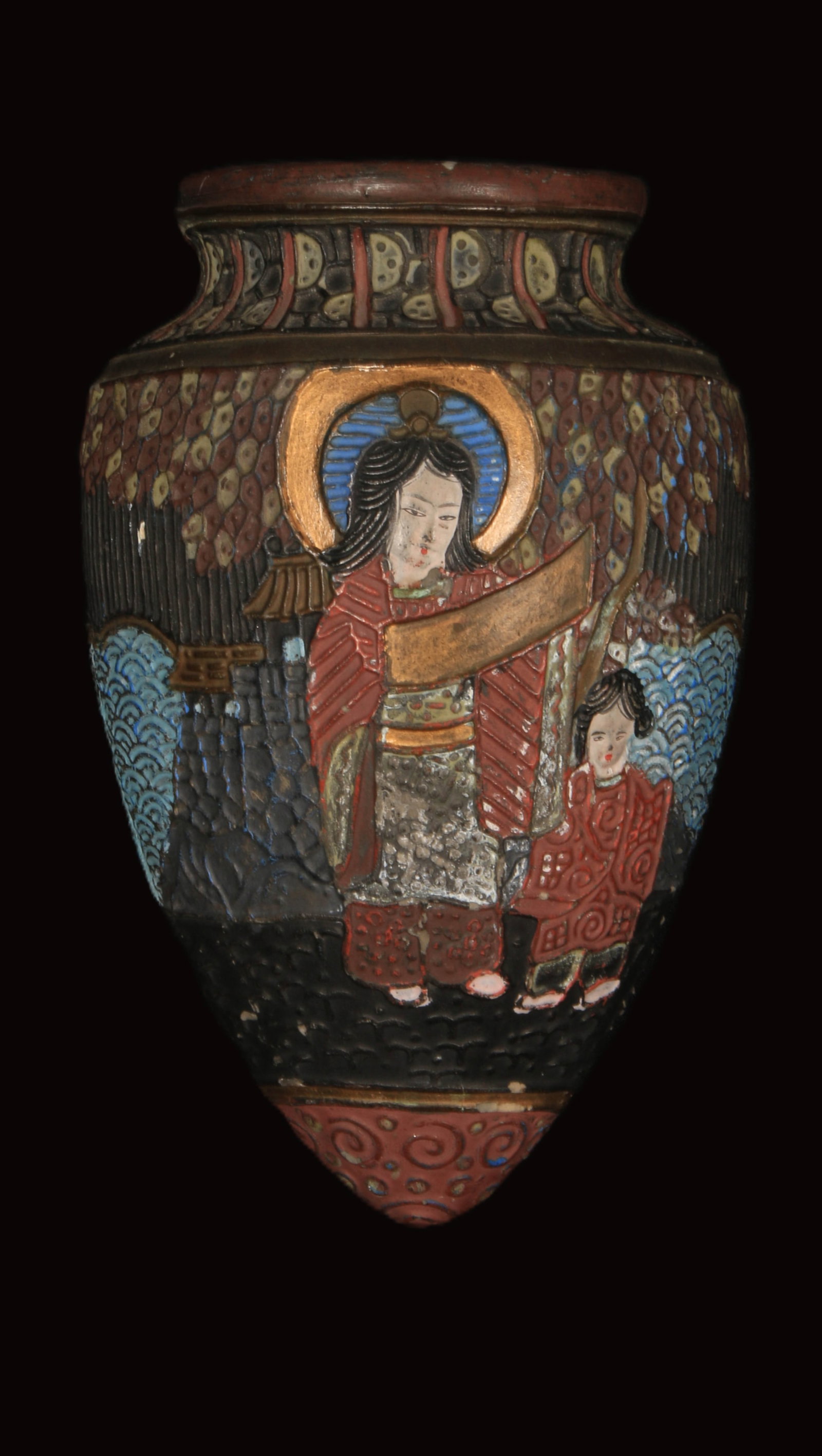 Antique Japanese Wall Vase: A clay wall vase with two figures. Stamped on reverse. 7" H.