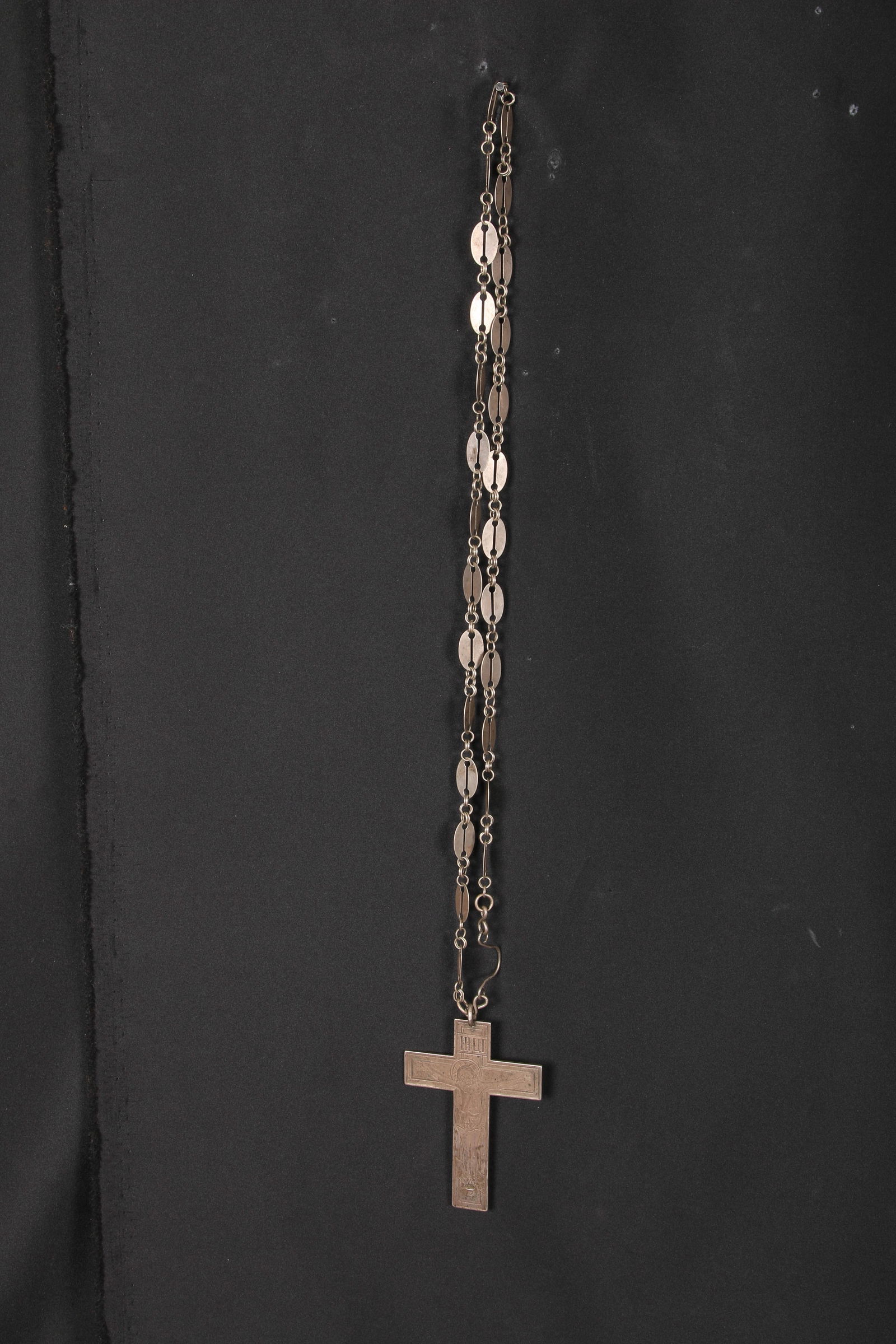 Russian Orthodox Cross: A large white metal pectoral cross, nice incised design with chain. Dated 1895. 4-1/2" h; with chain 22-1/2" L.