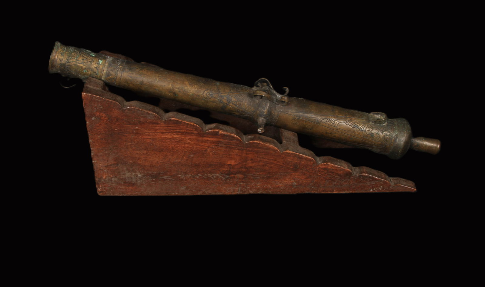 Philippines Lantaka Cannon: A bronze cannon with incised designs on barrel. 18" L. Mounted on wood display stand. Lantaka were widely used in pre-colonial Maritime Southeast Asia, particularly in Malaysia, the Philippines, and I