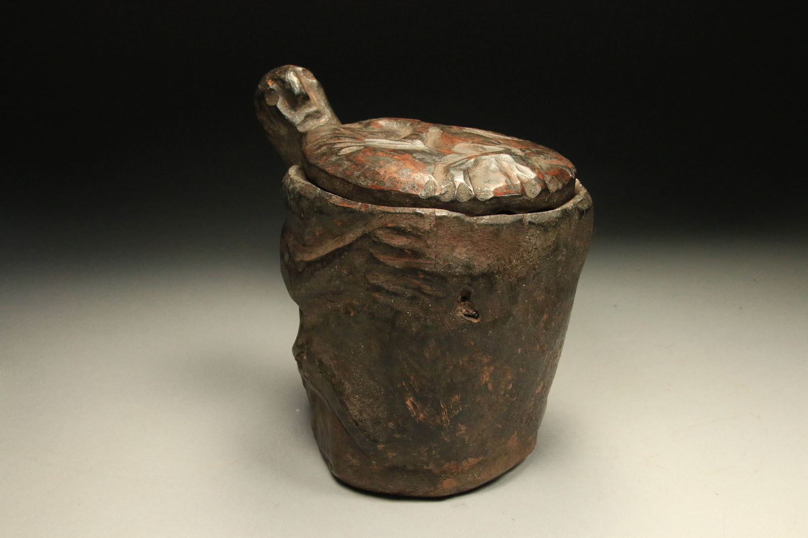 Philippine Ifugao Salted Meat Container: A carved Narra wood container carved in a highly stylized turtle shape with head on one side. 7-1/2" H x 8-1/2" W. This is an antique Philippine Ifugao tribal art salted meat container, also known as