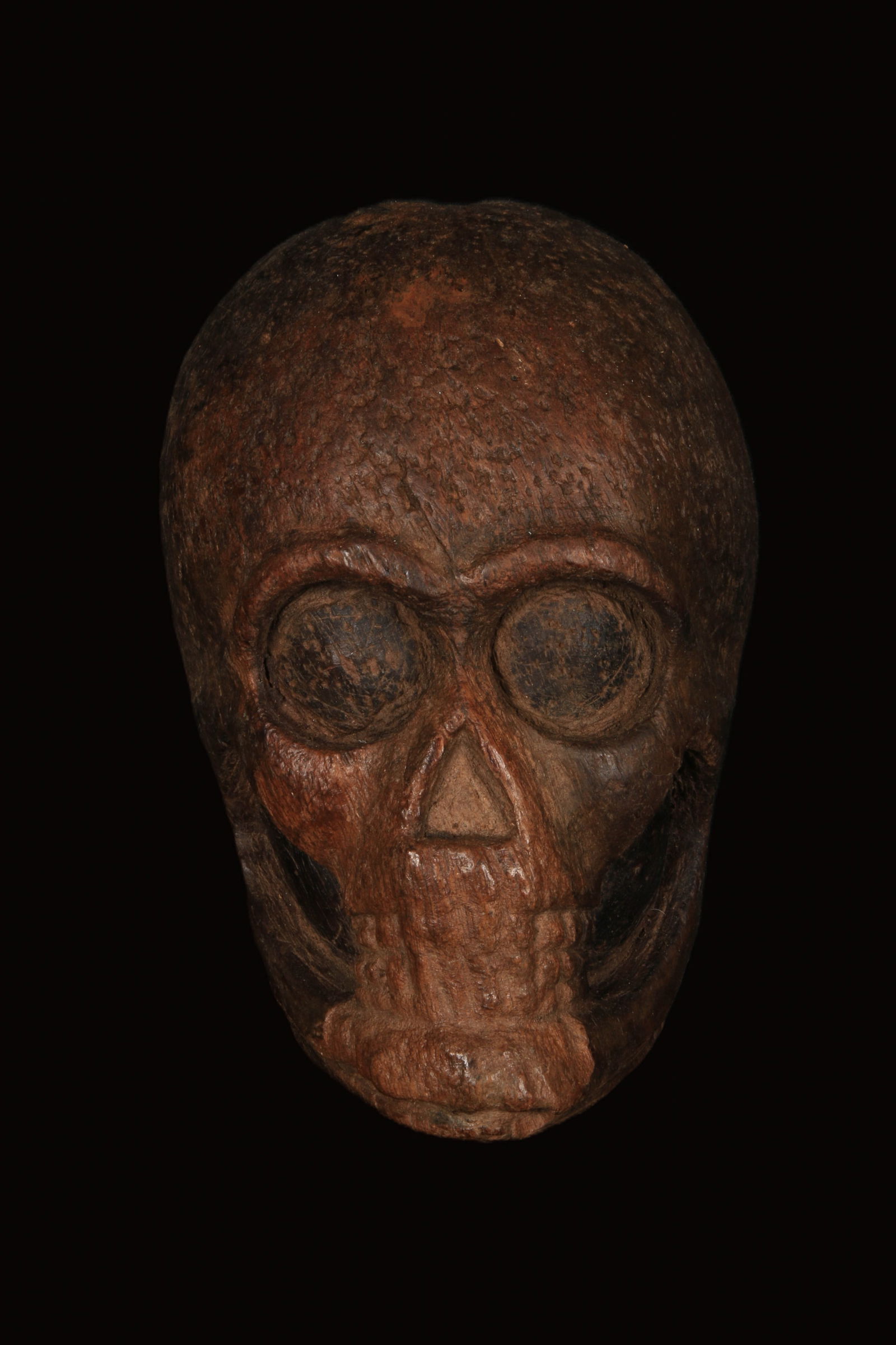 Paper Mache Mold: A wood paper mache mold of a skull. 7" H