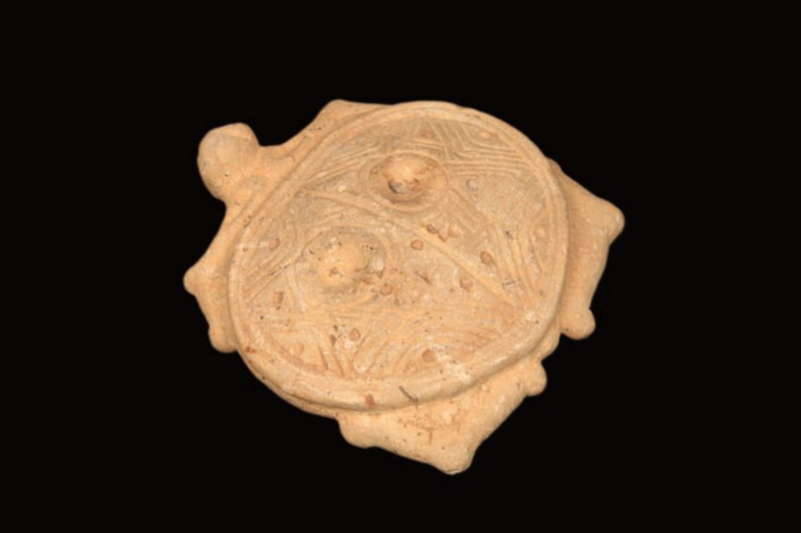 Pre-Columbian Stone Turtle: A Taino cream colored stone turtle with abstract designs on shell. 5" L. Provenance: Ex collection Tony Milton, NM.