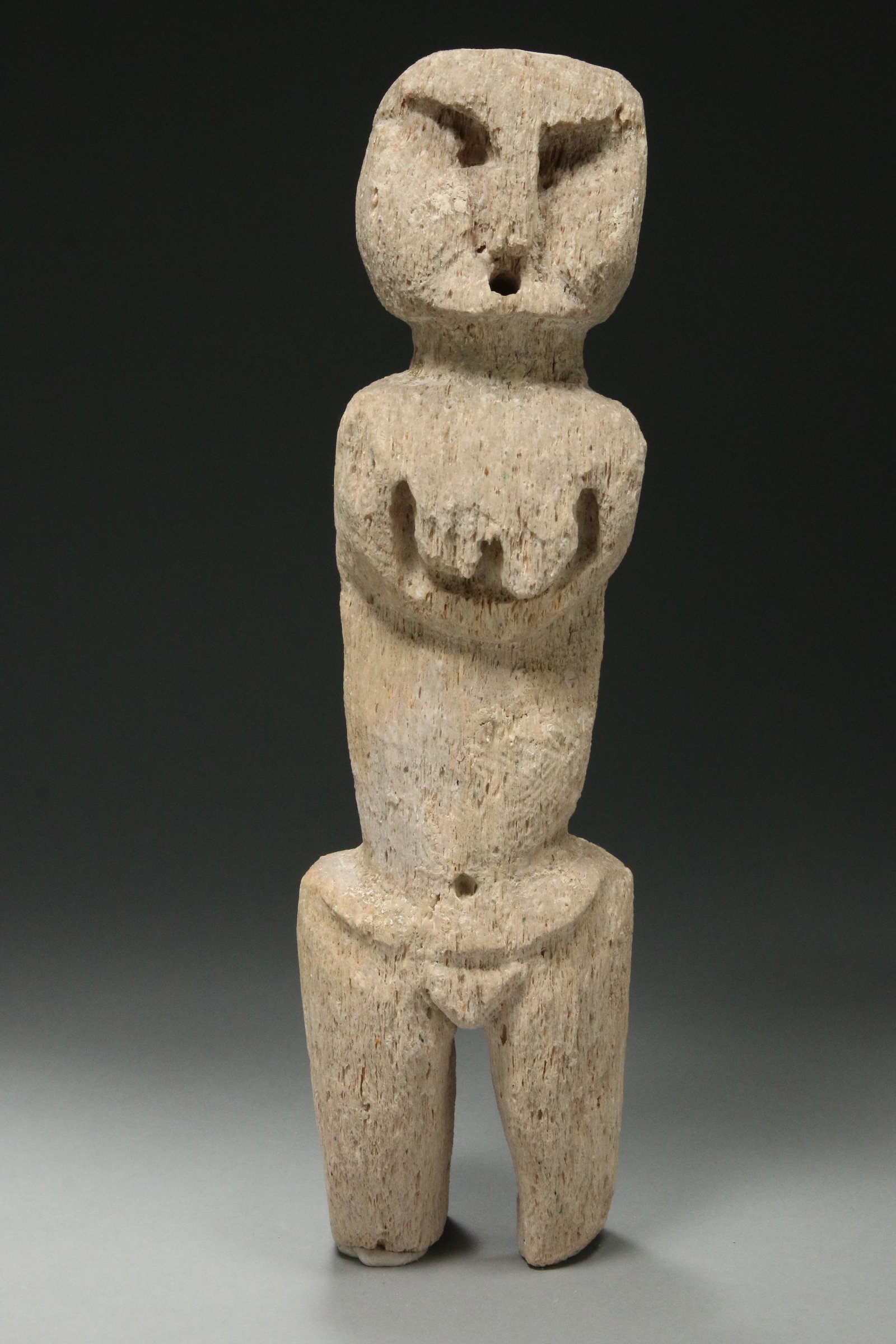 Inuit Bone Figure: ancient carved bone figure, 12" H