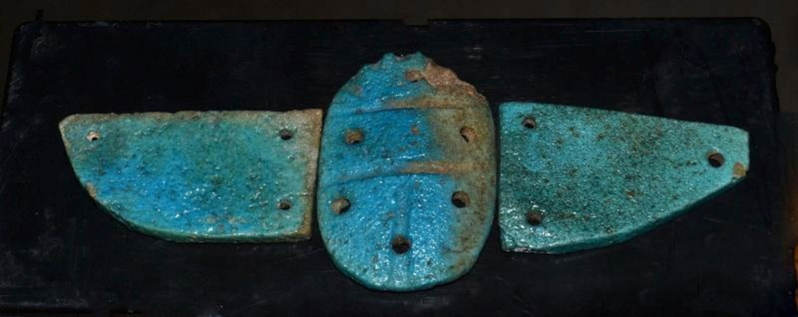 Ancient Egyptian Blue Scarab with Wings: Ancient Egyptian blue faience scarab ensemble. Comprising of the beetle scarab in the center, flanked by the faïence wings. Late Period, 600-400 B.C. Scarab measures 2 inches long X 1 1/4-inch wide, 