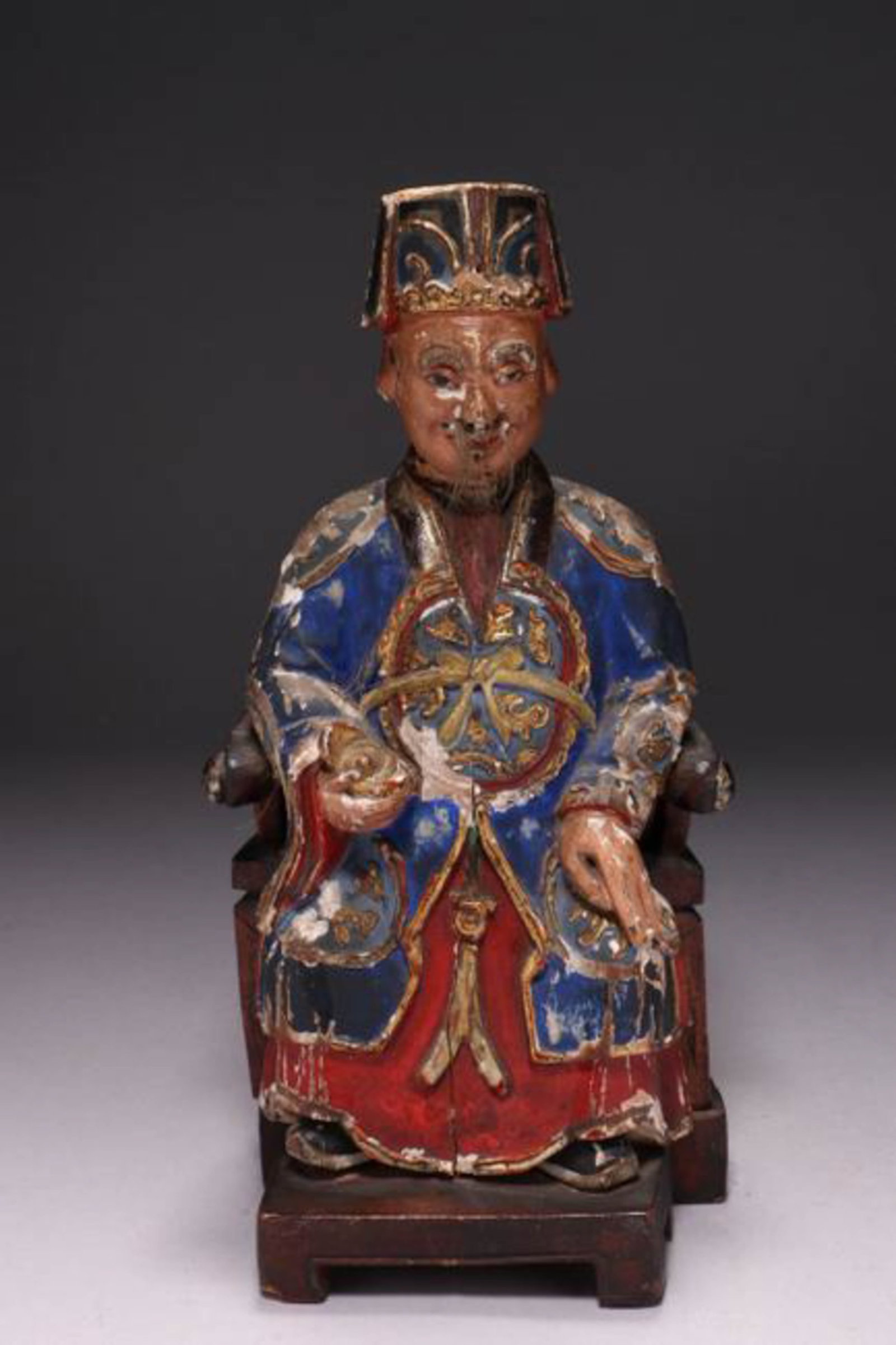 Chinese Altar Figure: A polychrome wood figure, seated, wearing robes, late 19th early 20th century. Base is newer