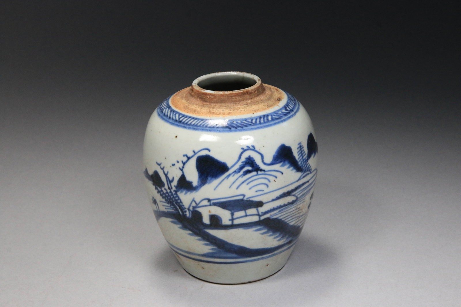 Chinese Blue and White Porcelain Ginger Jar - 19th Century: Antique Chinese blue and white porcelain ginger jar with a hand-painted landscape scene, commonly referred to as "Canton style". Ovid shape with an unglazed, raw rim. 4-1/4" H.