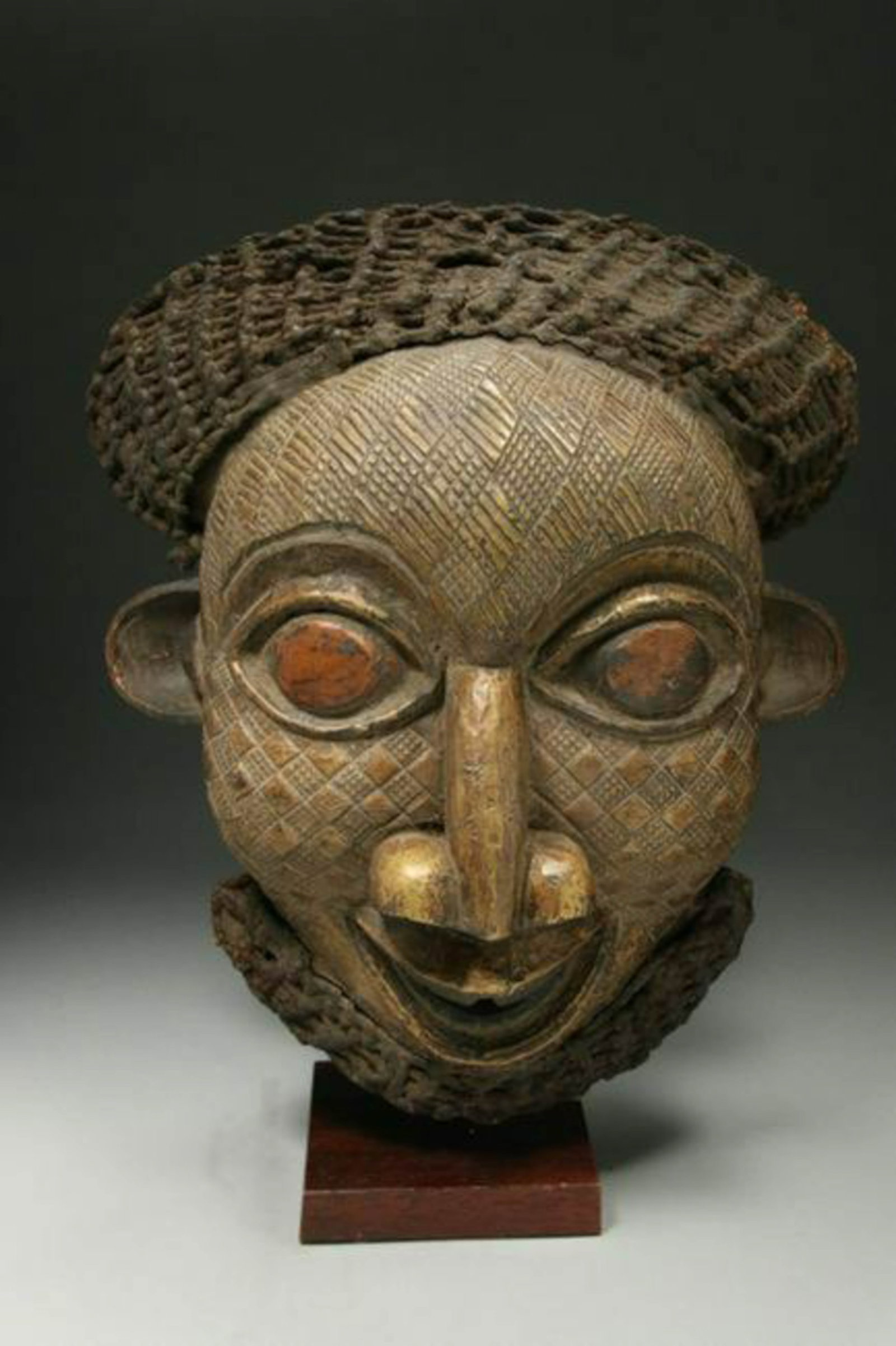 African Art Cameroon Mask: A Cameroon Kingdom mask, early 20th century. 16" H; 5 lbs. 10 oz Provenance: Ex. Collection, Texas