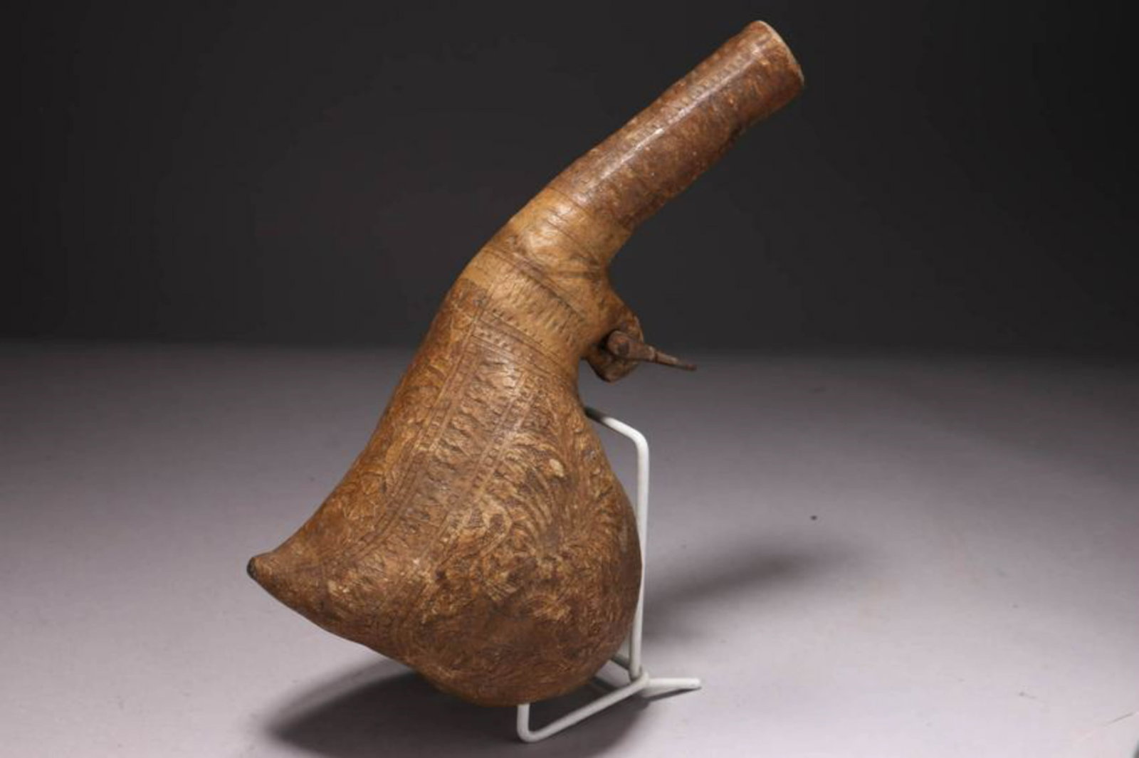 Middle East Gun Powder Pouch: A leather gun powder vessel, nicely etched, camel scrotum. 9-1/2" H