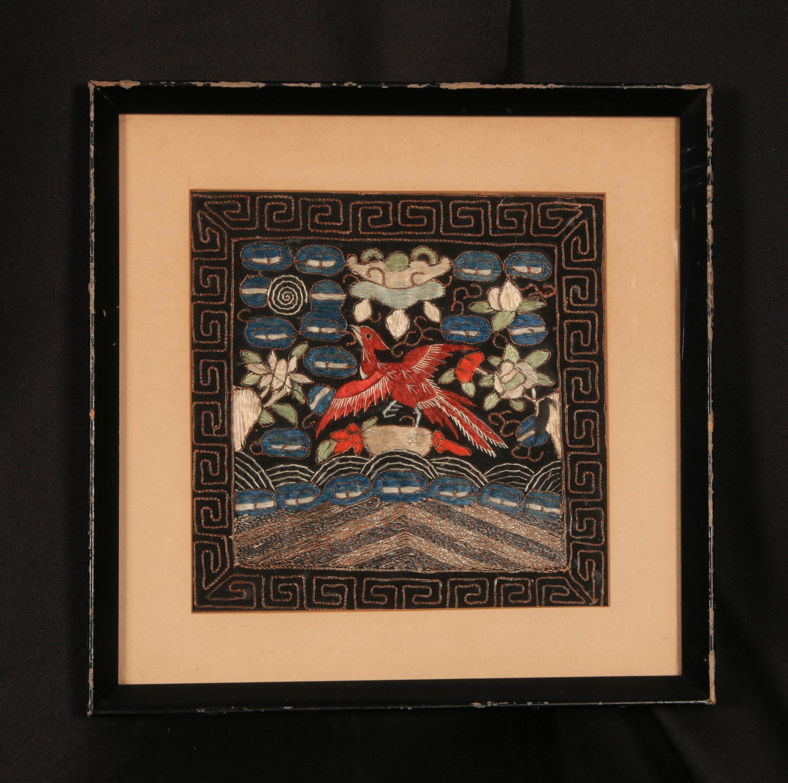 Chinese Rank Badge: Antique Chinese Mandarin Square, specifically a civil 9th rank badge featuring a paradise flycatcher bird, dating from the late Qing Dynasty. An embroidered paradise flycatcher, representing the lowes