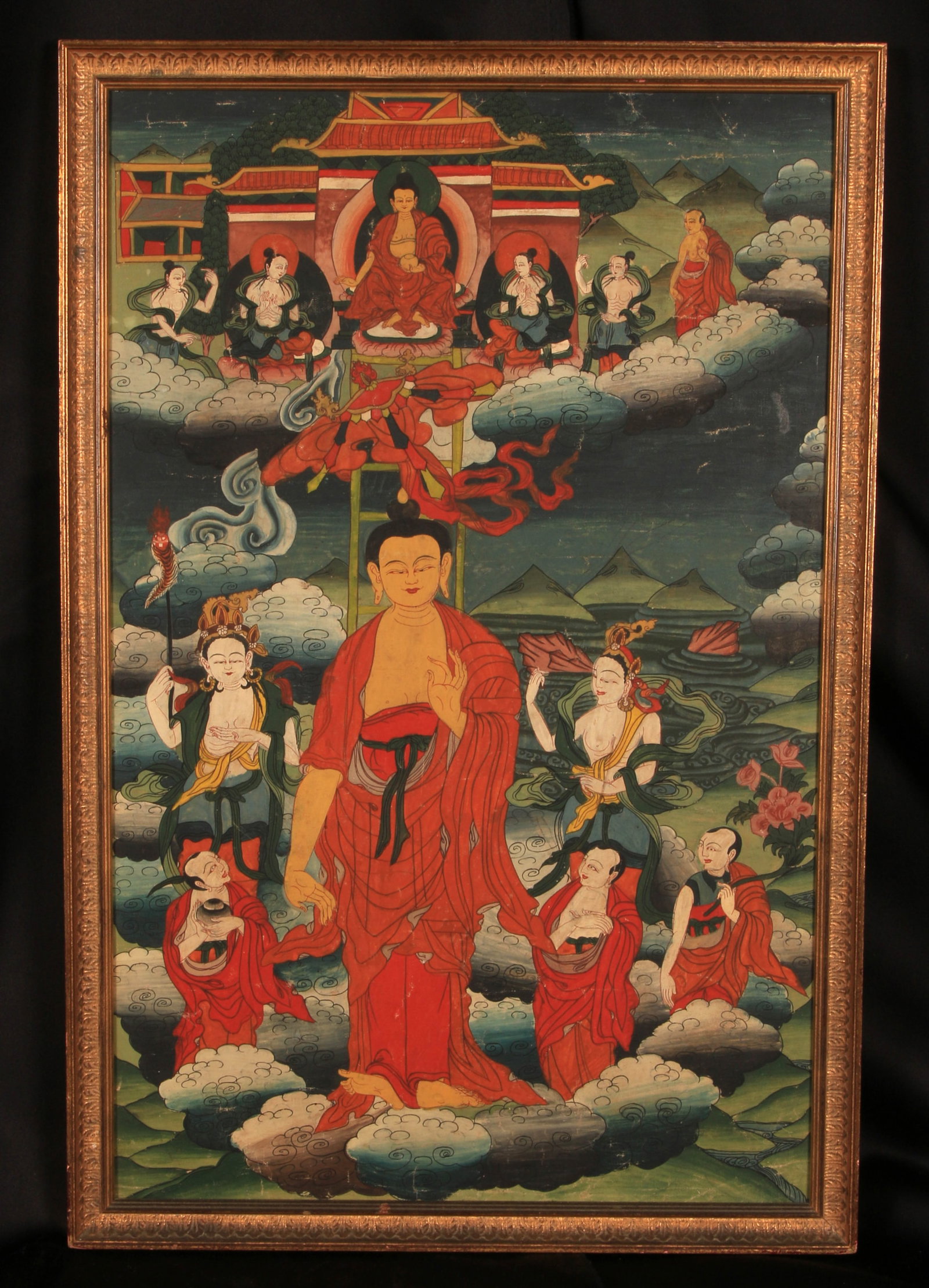 Tibetan Thangka: Tibetan Thangka painting depicting the Buddha Shakyamuni's descent from the Heaven of Thirty-Three. 25" x 16"Buddha Shakyamuni is shown returning to earth from the god realm, accompanied by his discip