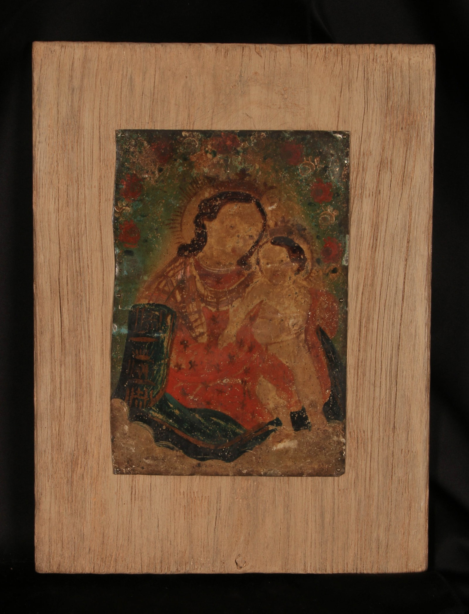 Retablo Painting Mexico 19th C.: It depicts "Nuestra Señora de Refugio de Pecadores" (Our Lady, Refuge of Sinners). The Virgin Mary is shown crowned, surrounded by a garland of roses, and supporting the crowned Christ Child. Tin mou