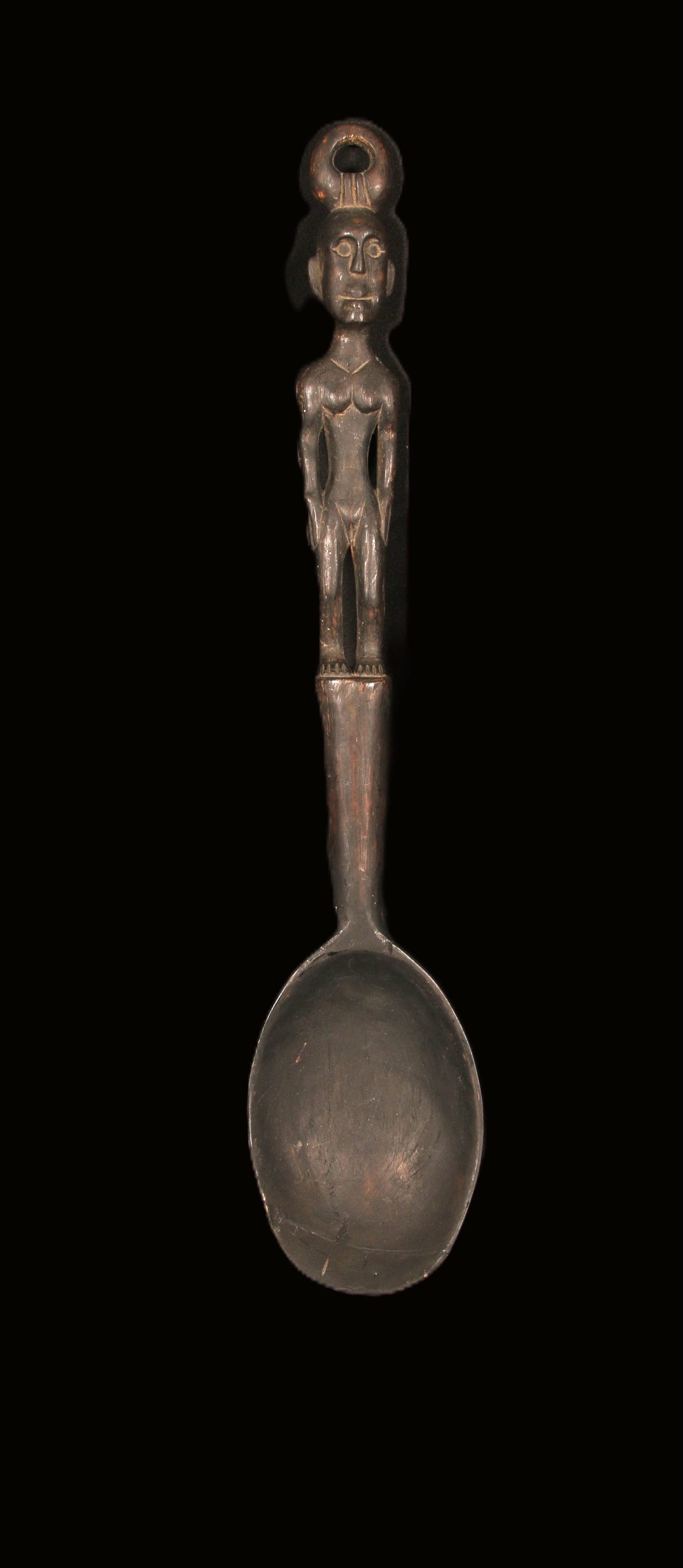 Philippines Bulul Spoon: A large Bulul spoon with Bulul figure as handle, suspension loop at top of head.