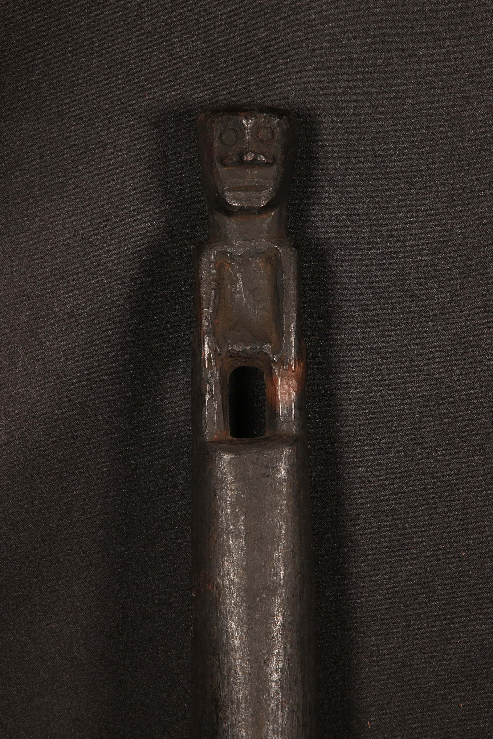 Phillippines Stirrer - Ifugao People: A large stirrer cooking utensil with a Bulul figure as handle. traditional Ifugao cooking stirrer (also known as an Iduh or Pa-o), a hand-carved wooden utensil from the Ifugao people of the Cordillera