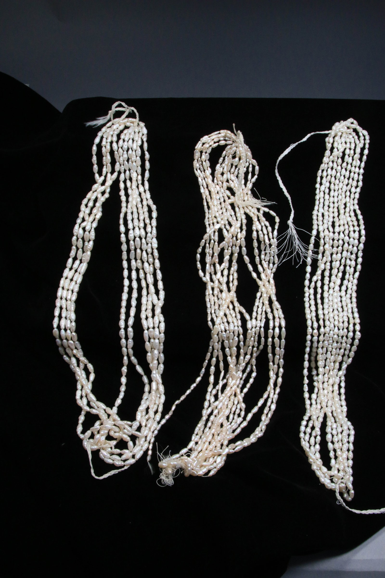 Mother of Pearl Necklace Strands: Approximately 17 stands of southeast Asian mother of pearl beads. Approx.. 28" L.