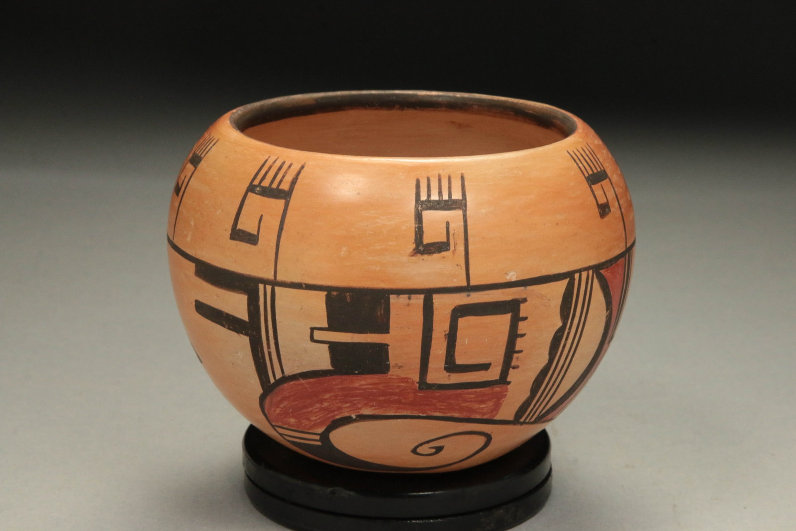 Native American Hopi Pottery - Rosetta Huma: A hand-coiled Hope pueblo polychrome bowl, with geometric stylized designs. Signed Rosetta Huma. 3-1/4" H x 4-1/2" W.