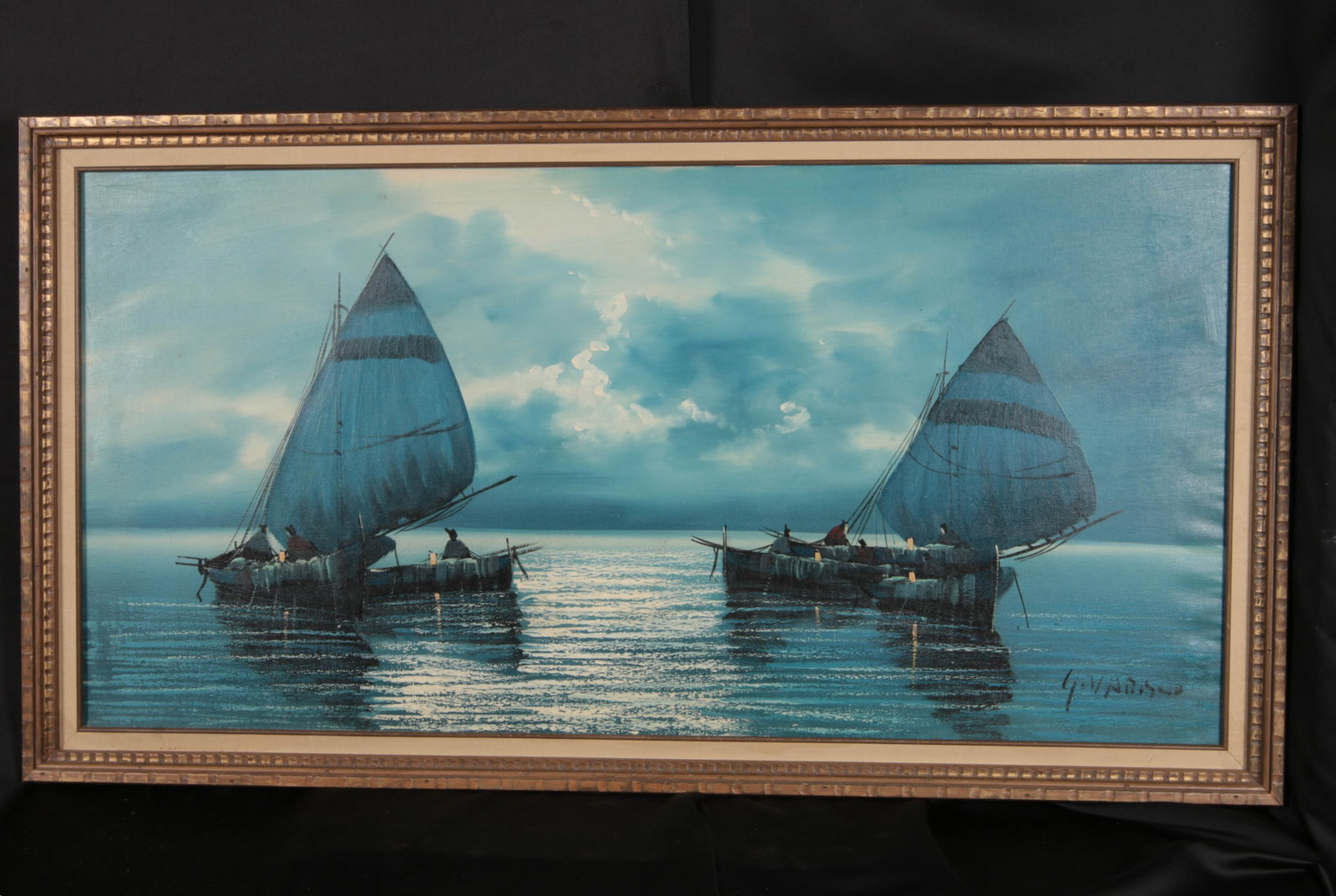 Oil Painting Seascape: An oil on canvas of a classic Mediterranean fishing boats with distinctively shaped, vibrant blue sails resting on a calm sea under a moody, atmospheric moonlit sky. Circa 1950s?1970s. Signed lower ri