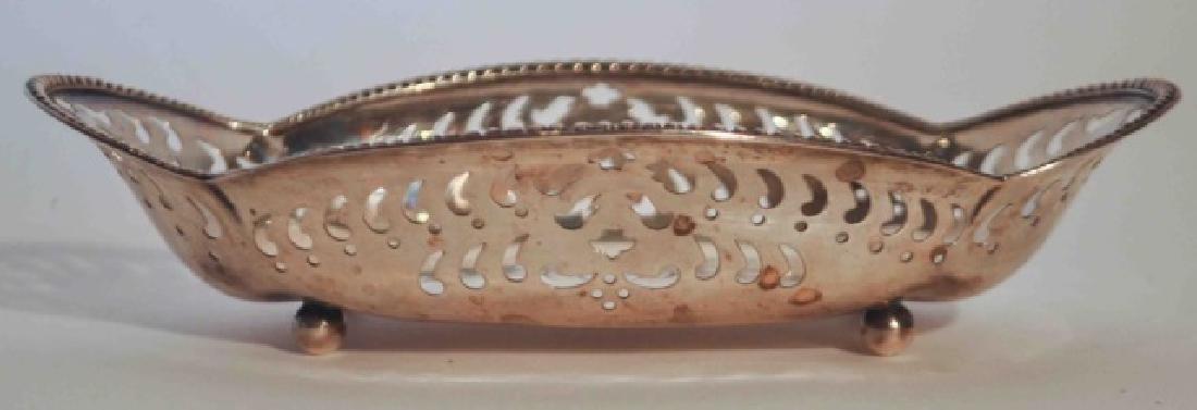 Tiffany & Co. Sterling Silver Filigree Candy Dish: Authentic designer Tiffany & Co, makers, sterling silver filigree reticulated candy dish resting upon ball feet.. Numbered on base 13330-6281 Monogrammed. In excellent condition. 4.13 Troy oz. 8 x 4 1
