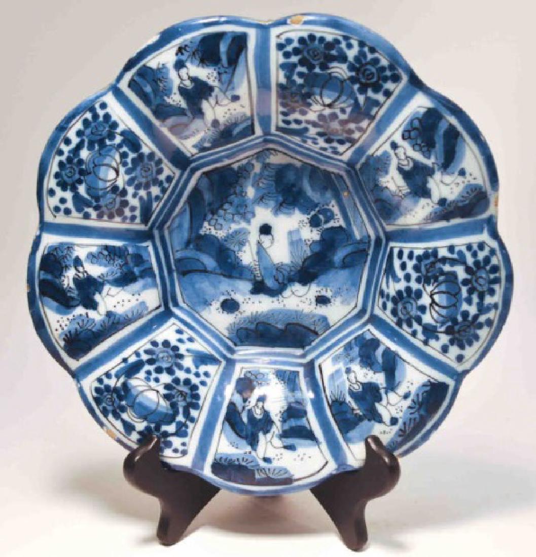 17th Century German Faience Blue Lobed Dish: German faience lobed blue and white dish c.1700, decorated in under glaze blue in the Chinese Transitional style. German, Frankfurt factory: Manganese group, late 17th century.